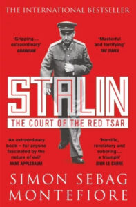 Book cover of "Stalin" by Simon Sebag Montefiore, depicting a stern portrait of Joseph Stalin against a somber background, symbolizing his dictatorial reign.